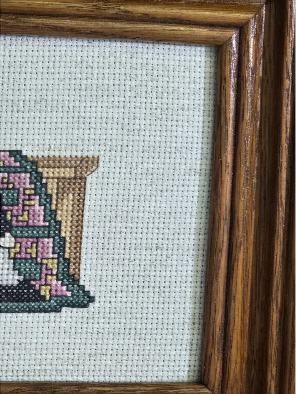 Country Cross stitch framed 9.5x7.5 has some discolorations.